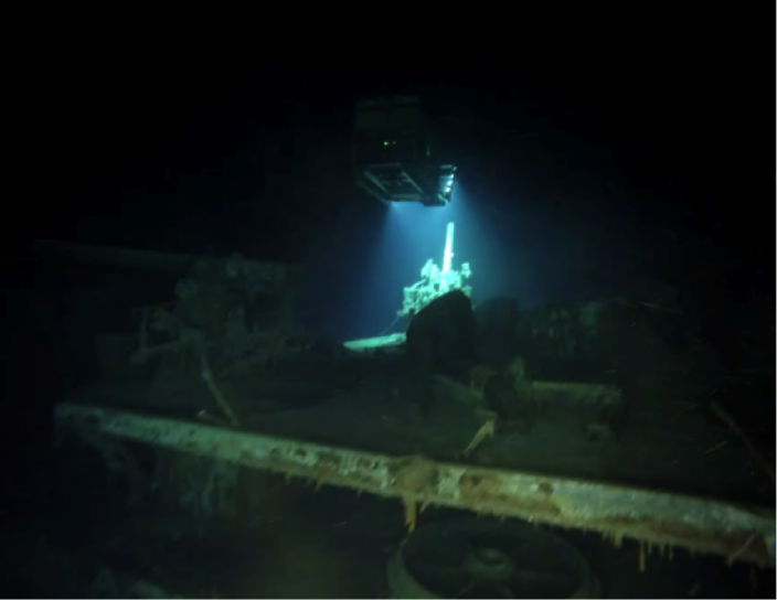 An ROV illuminates HMAS Sydney’s port 4-inch anti–aircraft gun.